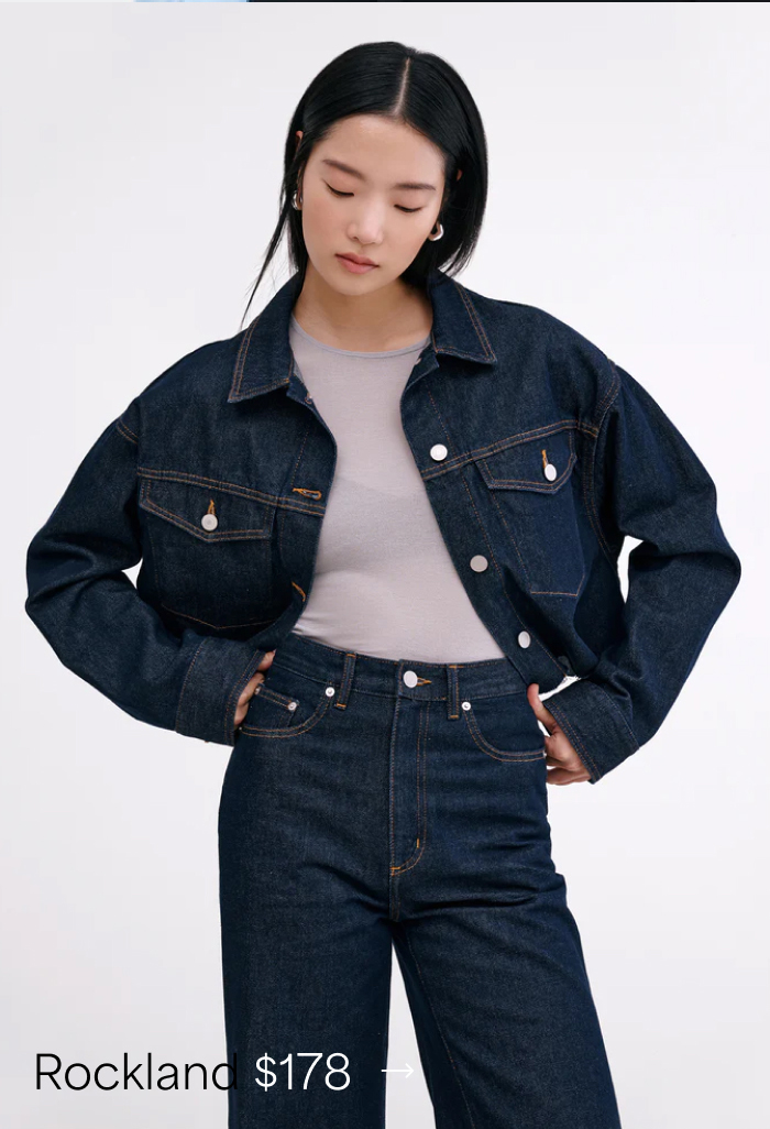 Xun wears The Rockland Denim Jacket and high‑waisted jeans, labeled “Rockland $178.”