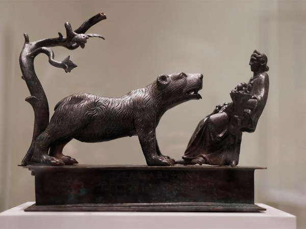 From the Dea-Artio group. Bronze bear leaning in.