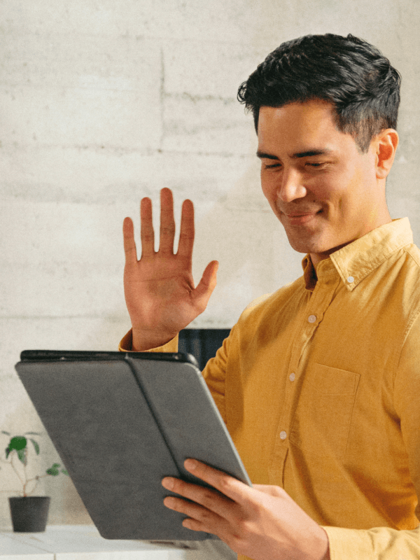 Photo-of-man-talking-during-a-video-call-on-tablet
