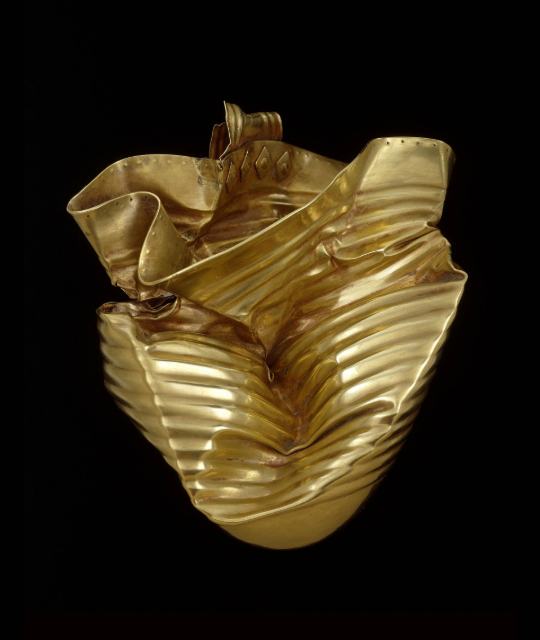 Gold vessel which has been mishaped. 