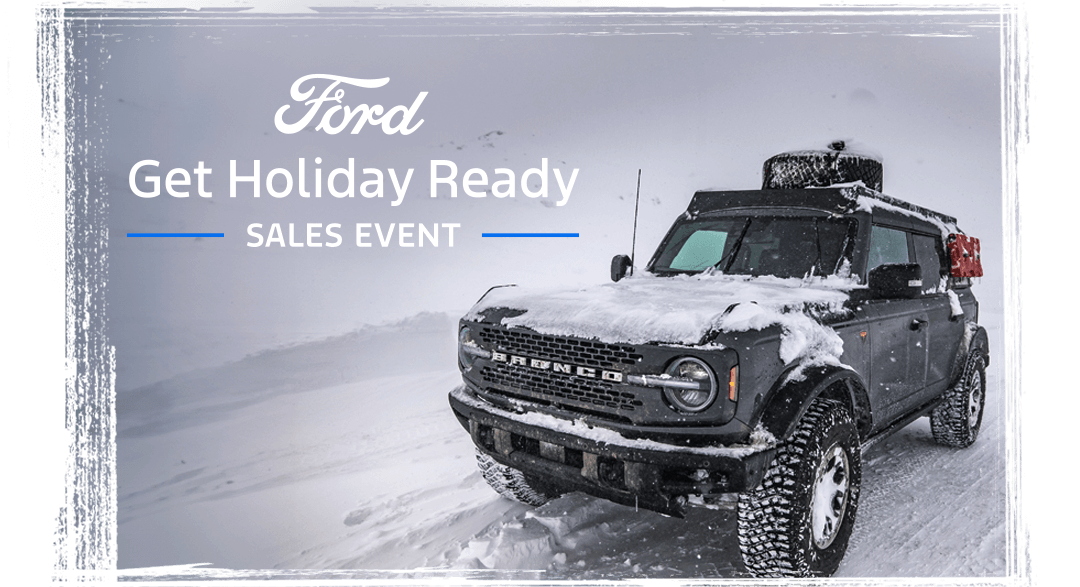 A Bronco&reg; Sport SUV being driven on a snowy road, with the words &ldquo;Ford Get Holiday Ready Sales Event&rdquo; placed overtop the image