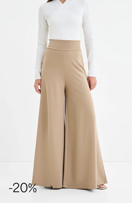 Rocio in The Georgia Pants in Sand. Wideleg and full length.