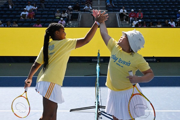 Kids playing tennis
