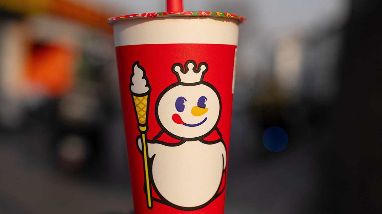 The Snow King mascot on a cup at a Mixue store in Beijing, China