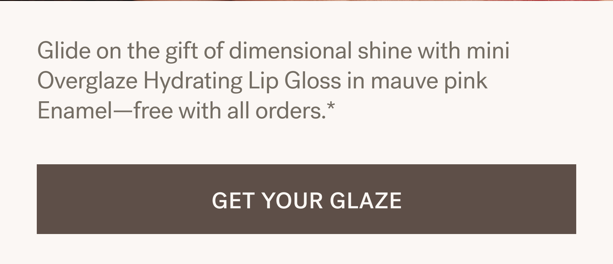 Glide on the gift of dimensional shine with mini Overglaze Hydrating Lip Gloss in mauve pink Enamel—free with all orders.*