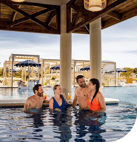 Two couples at swim up bar.