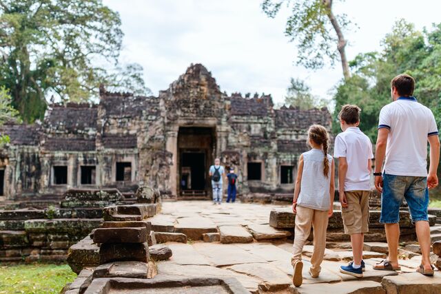 A family visiting Angkor Wat