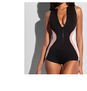 Black swimsuit with pink side panels and a front zipper.