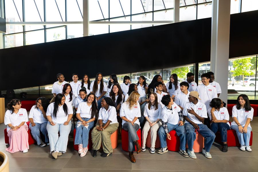 Photo: A large, wide shot of a group of students working and participating in launchpad at BU.