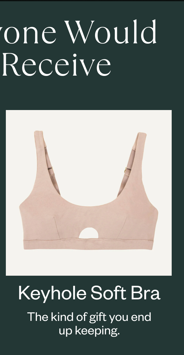 Beige keyhole soft bra with wide straps and minimal design.