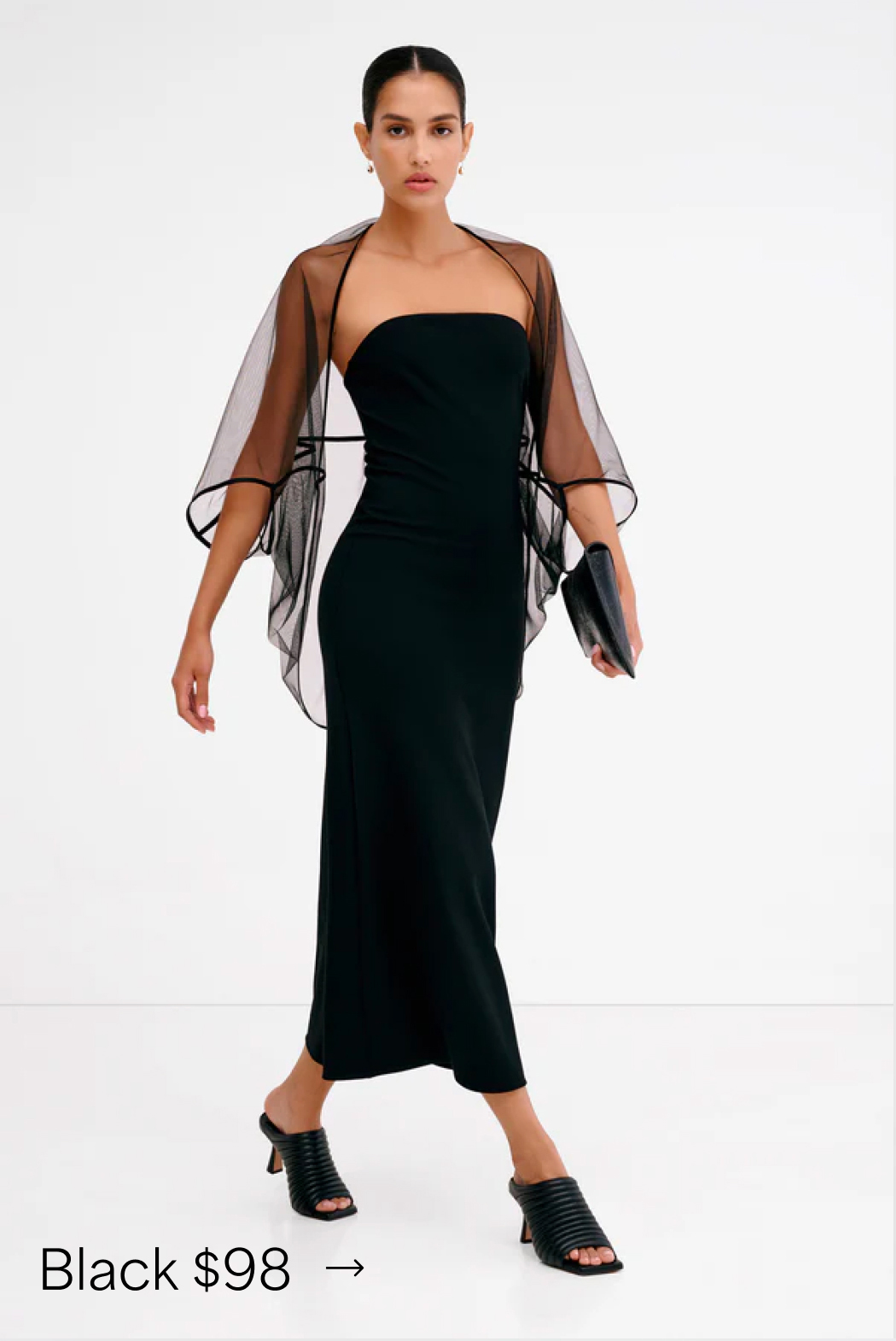  Astrid walks in The Stella Bolero, labeled “Black $98.”