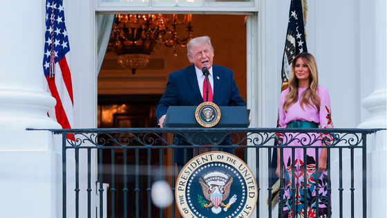 President Trump stands at a podium.