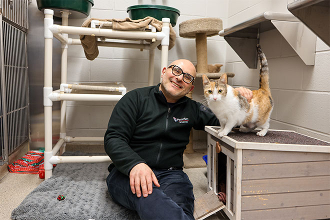 Carlo Siracusa, Penn Vet animal behavior expert, and a feline friend.