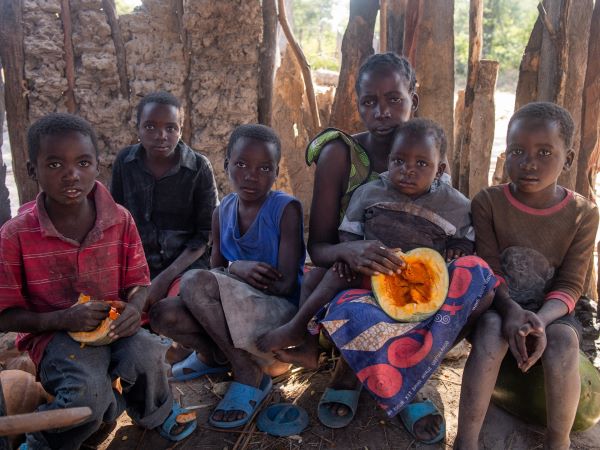 Alt-text: A family in Zambia photographed together