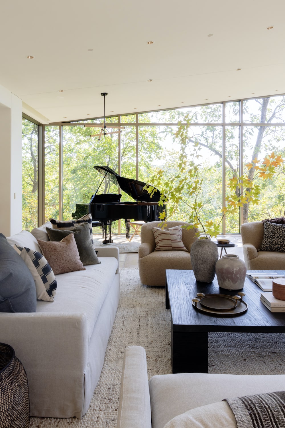 Trasitional living room featuring modern art over fireplace and Ace Accent Chair.
