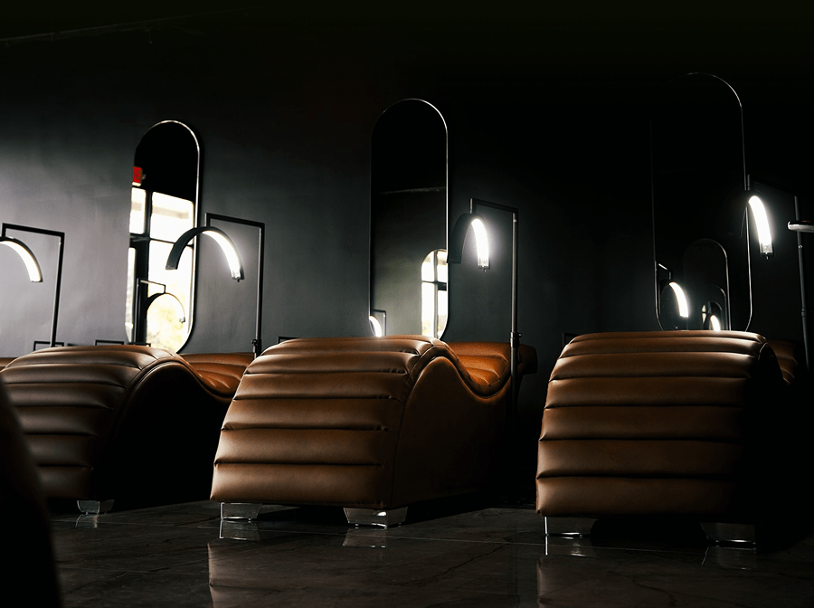 PLUSH + OAK Edda Cloud® Ergonomic Curved Beauty Beds in a salon.