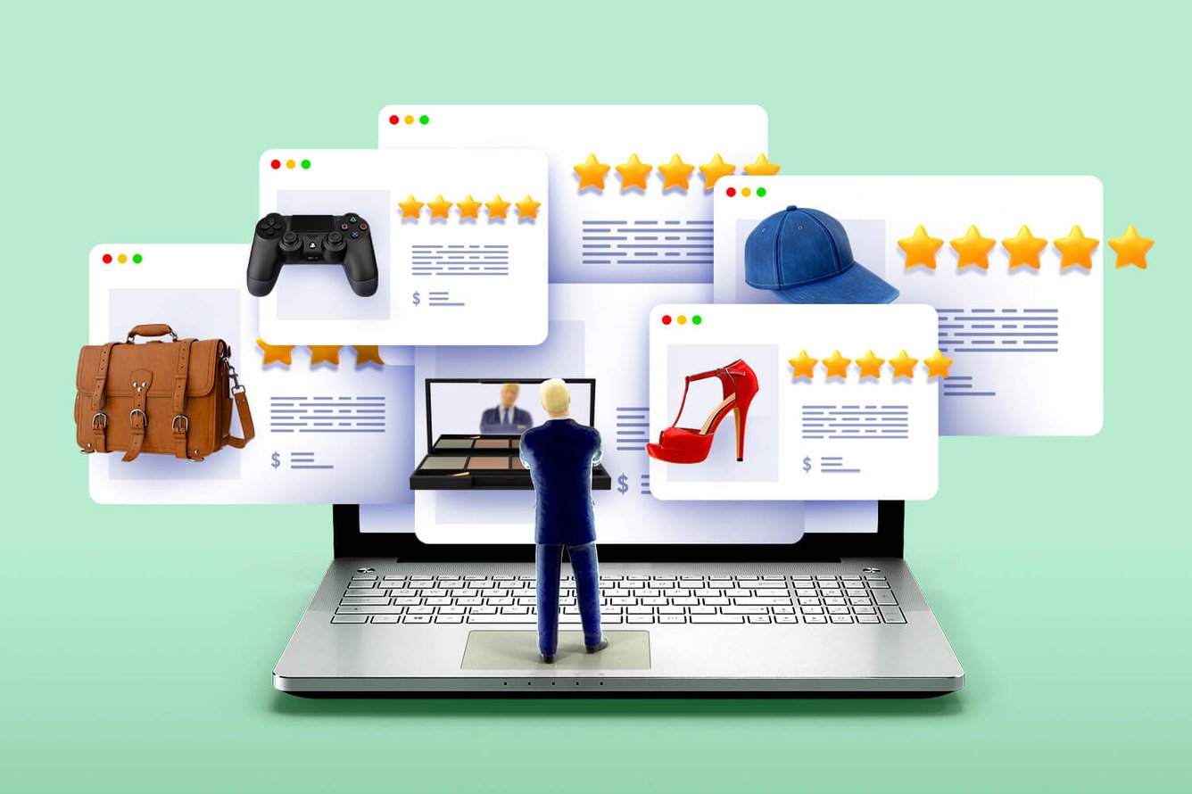A person standing before several 5-star reviews on a laptop