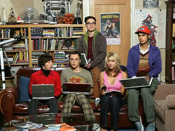 The cast of The Big Bang Theory work on their Dell laptops.