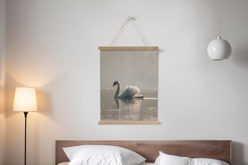 Minimalist bedroom wall decor featuring a hanging fabric poster with a swan on calm water