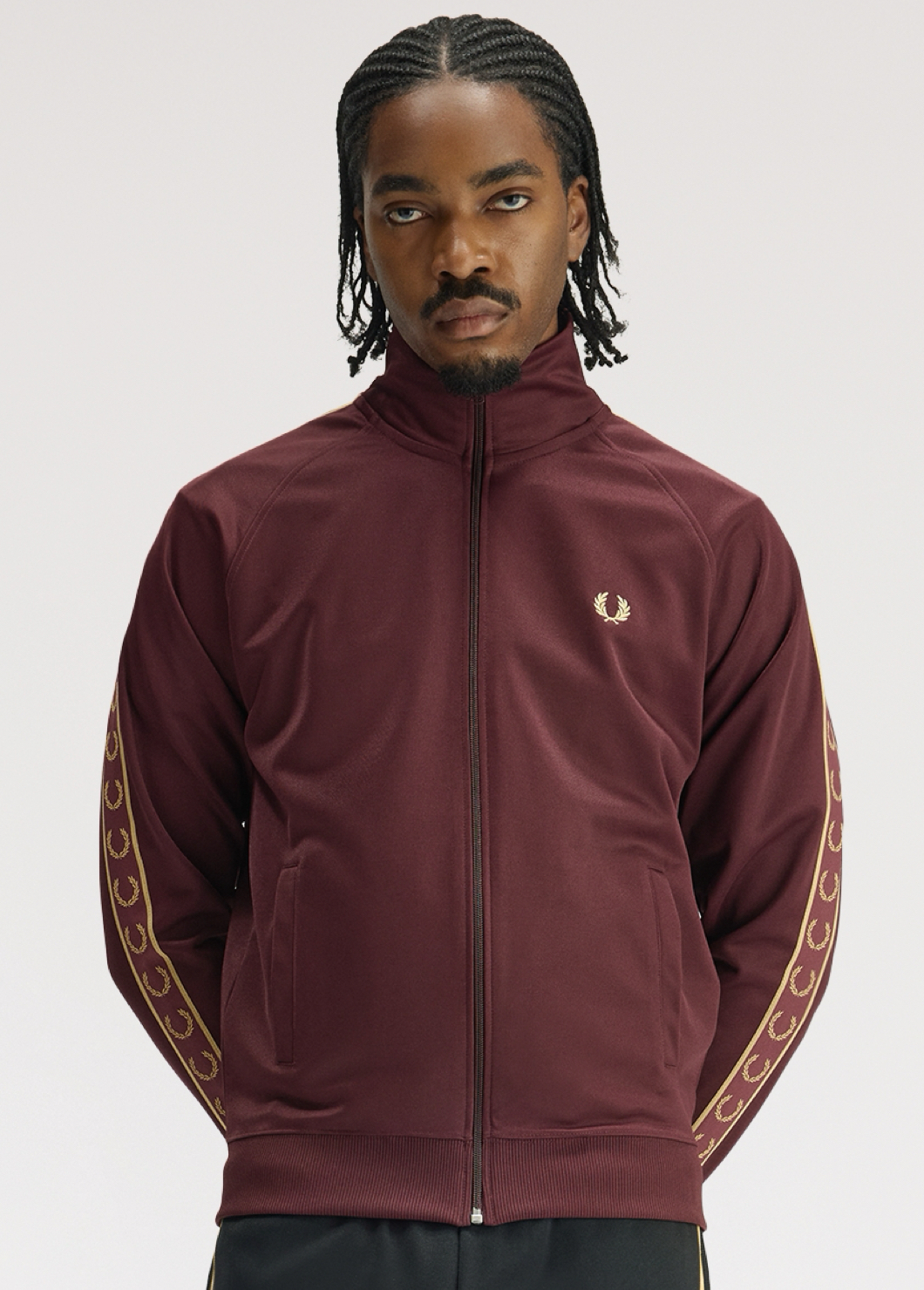 Taped track jacket in Oxblood colour with contrast gold taping
