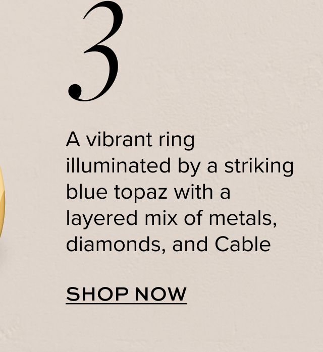 A vibrant ring illuminated by a striking blue topaz with a layered mix of metals, diamonds, and Cable