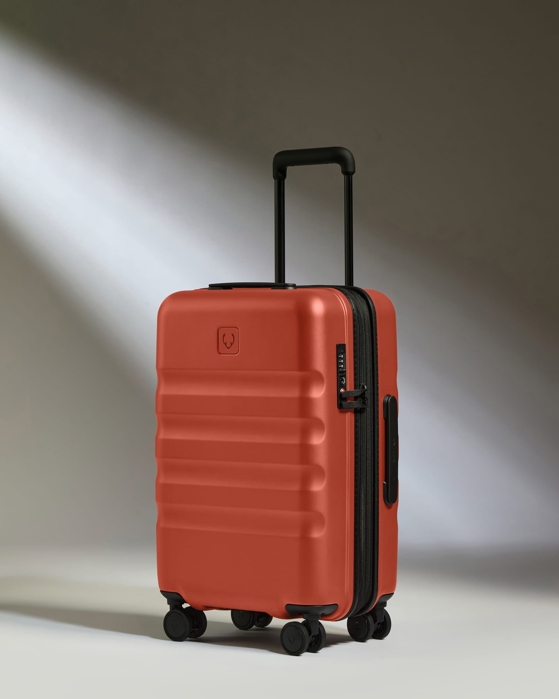 Image of Expandable Carry-on Luggage in Buckthorn Red - Icon Stripe