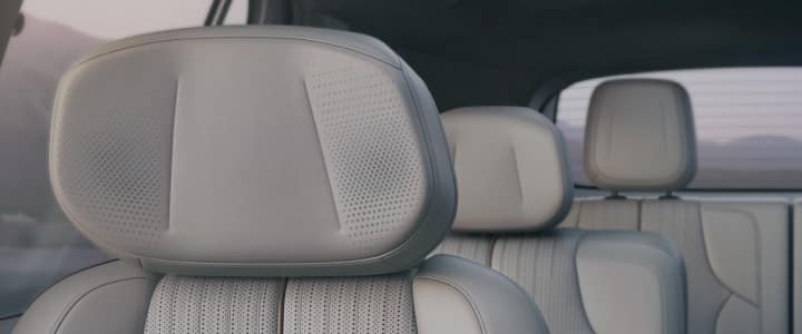 Front view of the 2026 Cadillac VISTIQ’s passenger, second, and third row seats.