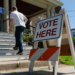 A voter walking up steps into a polling site in Portland, Maine.