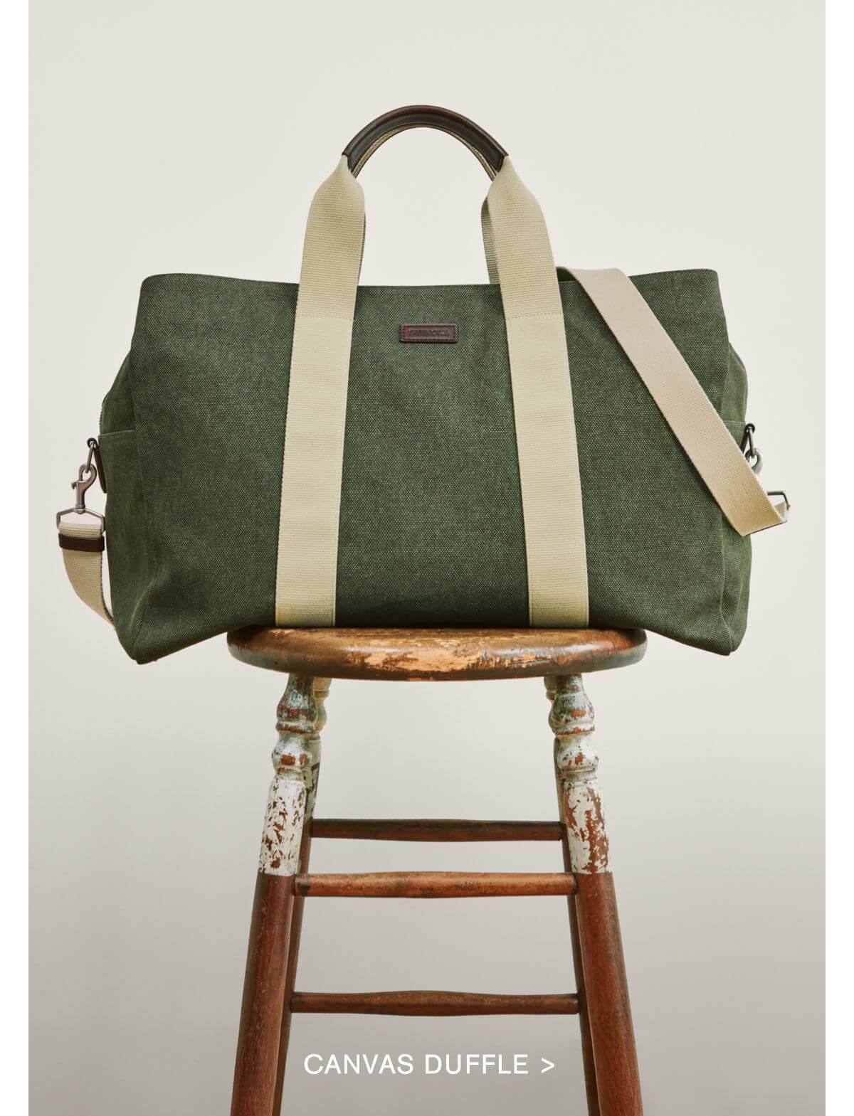 CANVAS DUFFLE >