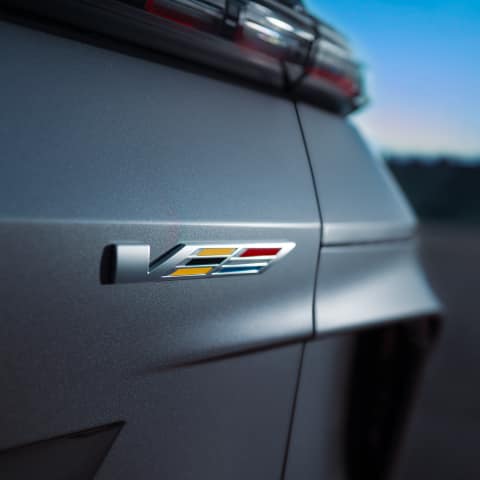 Extreme close-up detail of the V-Series badging on the 2026 LYRIQ-V.