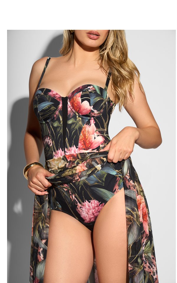 Floral print swimsuit with a sweetheart neckline and sheer overlay.