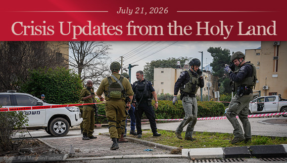 Israeli security forces at the scene where a rocket was fired from Lebanon into Northern Israel.