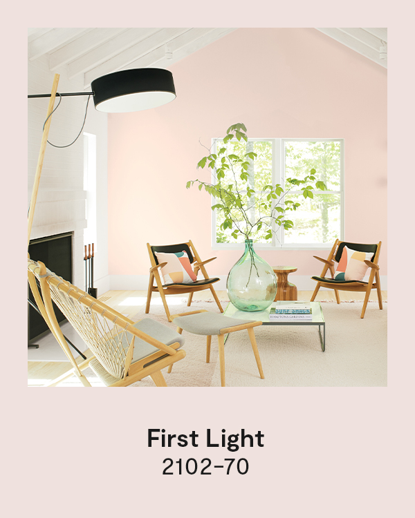 First Light 2102-70 - A living room with a pink painted wall and white ceiling and trim.