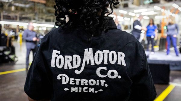 Worker wearing a Ford Motor Co shirt at the Ford Dearborn Plant, Dearborn, Michigan