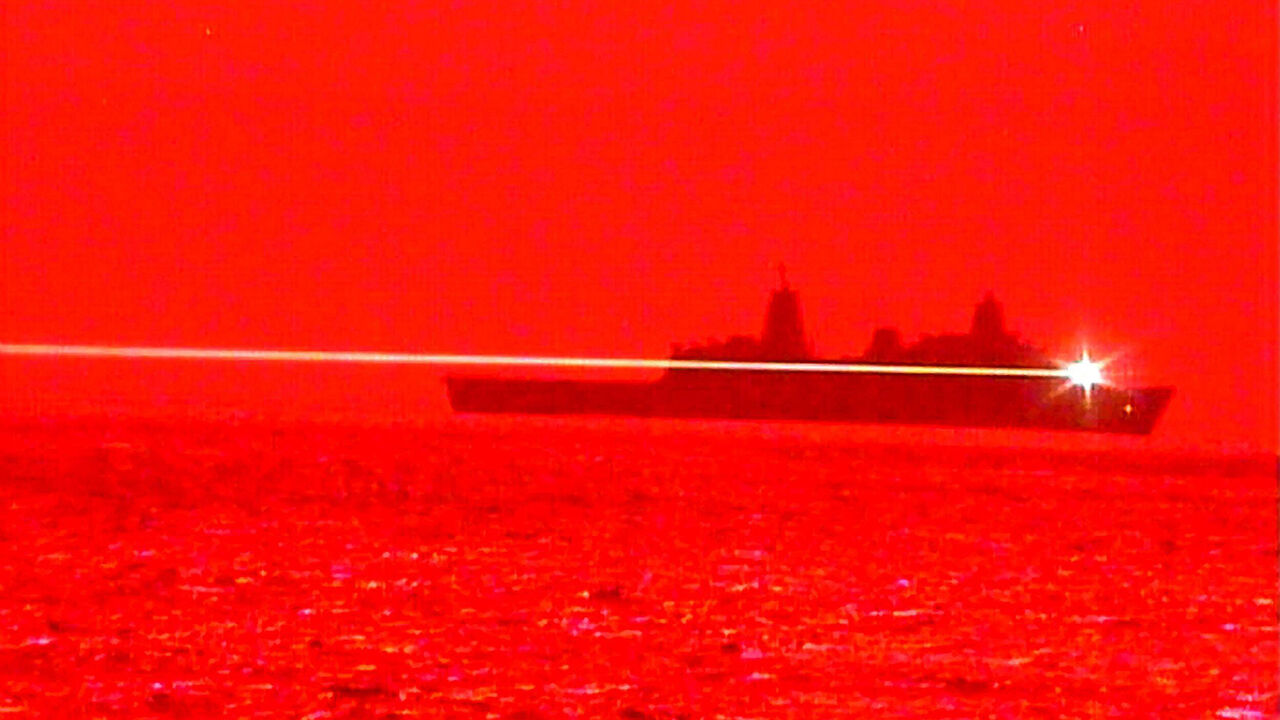 The U.S. Navy's ship USS Portland conducts a Solid State Laser - Technology Maturation Laser Weapon System Demonstrator test in the Pacific Ocean