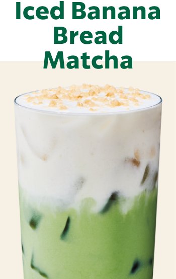 Iced Banana Bread Matcha | Iced matcha drink topped with white cold foam and a caramel-colored topping in a glass.