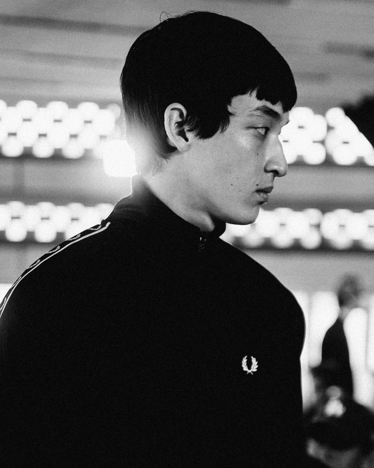 Model wearing a Fred Perry Taped Track Jacket 