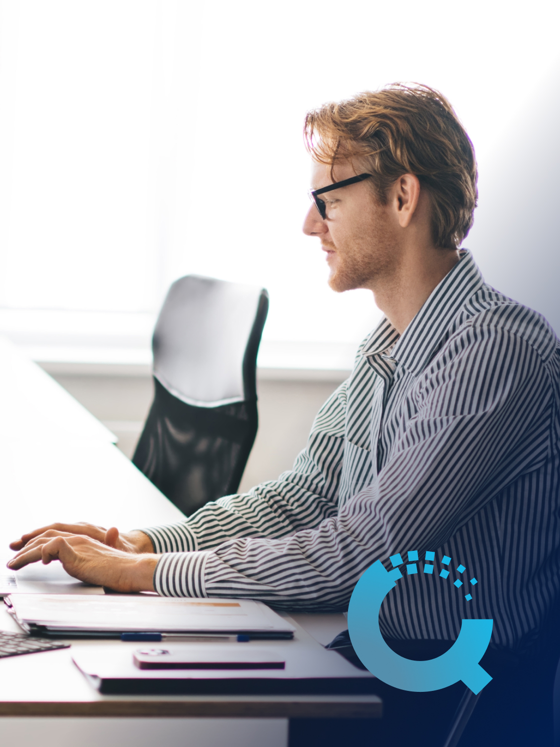 A seated IT Ops worker types on a keyboard using insights gained from Intel Device IQ.