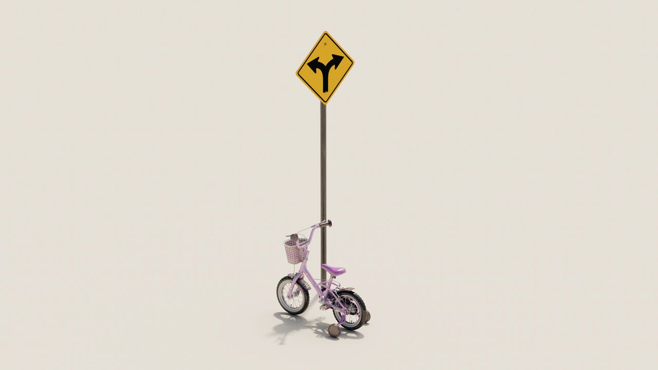 A pink kids’ bike leaning against a fork-in-the-road sign.