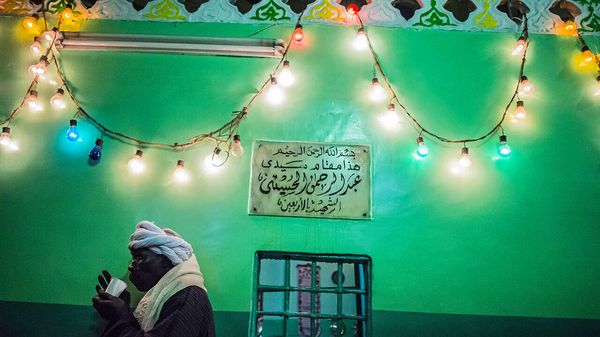 A man outside al-Hussein mosque in Cairo 