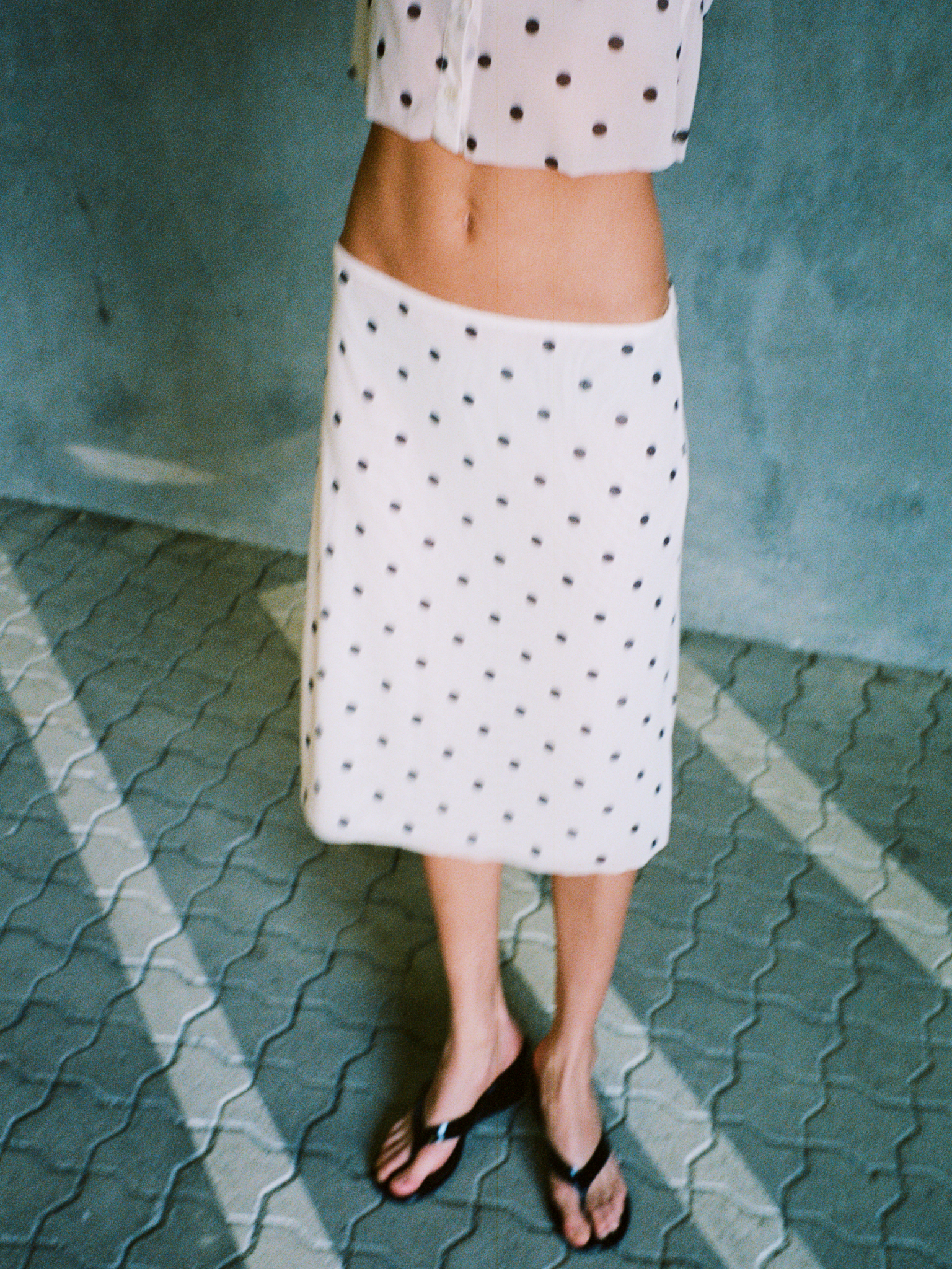 Girl in polka dot dress