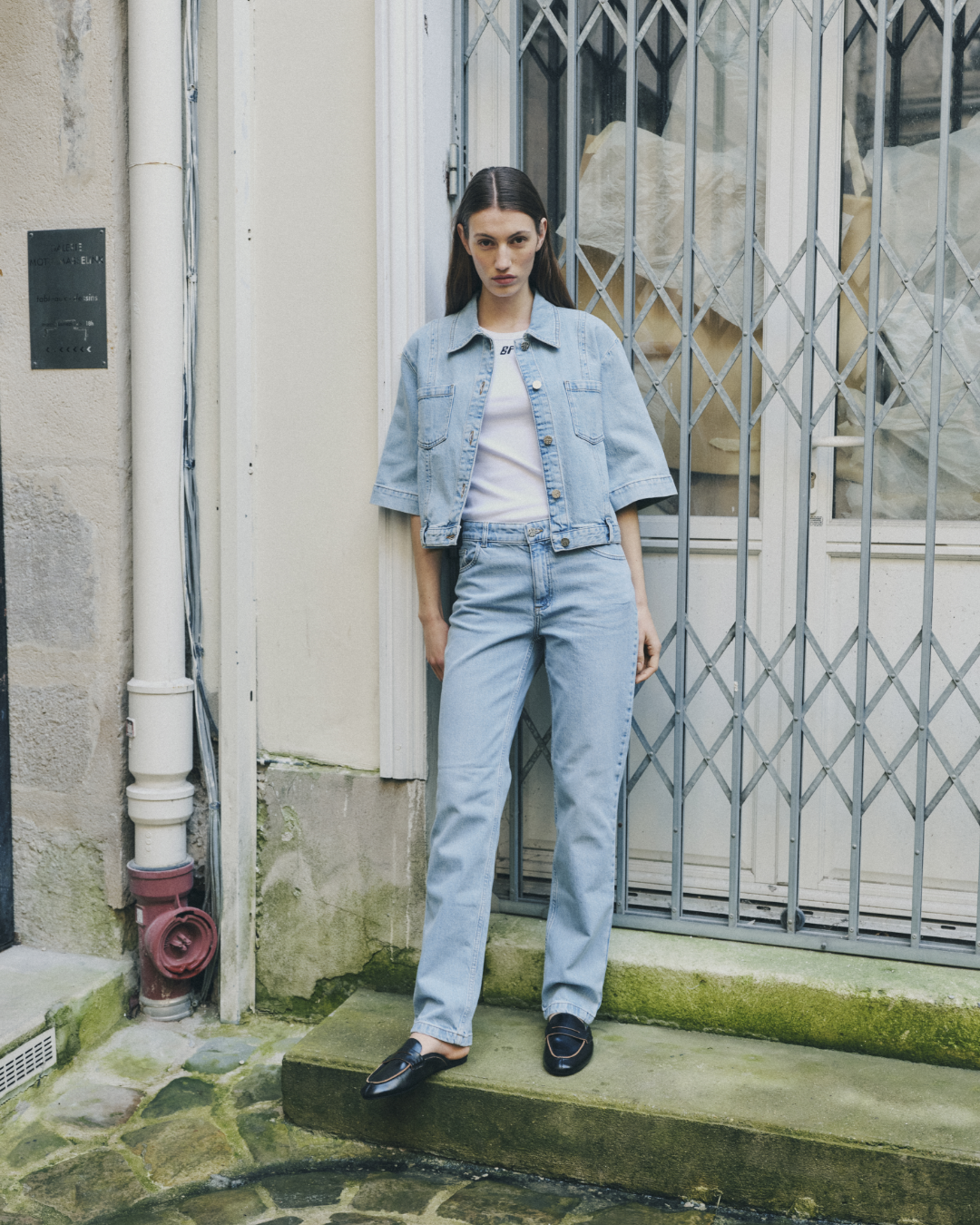 Girl in light blue denim set