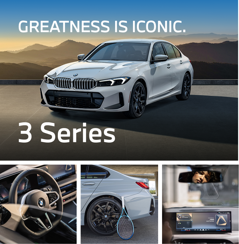 White 330i parked in front of mountains, showcasing interior finishes.