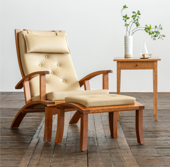 Lolling Chair and ottoman with the square end table beside.