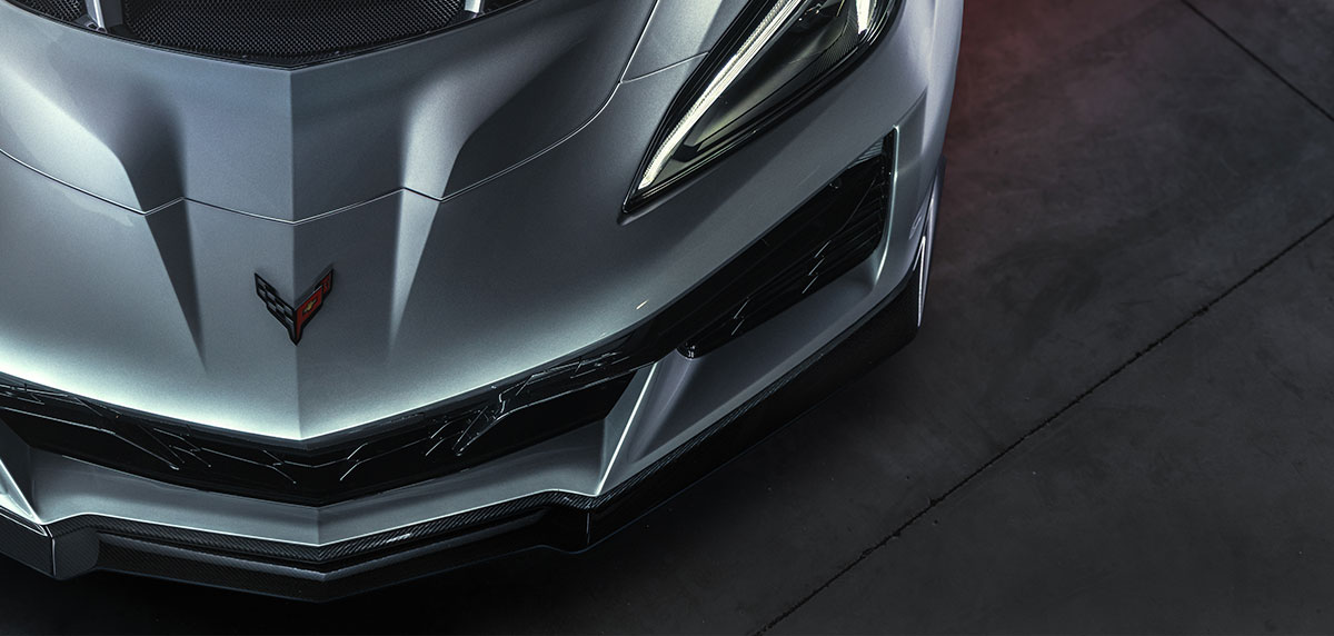 Overhead shot of the ZR1X in Sea Wolf Gray, with a focus on the aerodynamic hood and Corvette logo featured prominently on the hood.