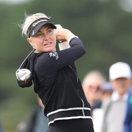 Women playing golf