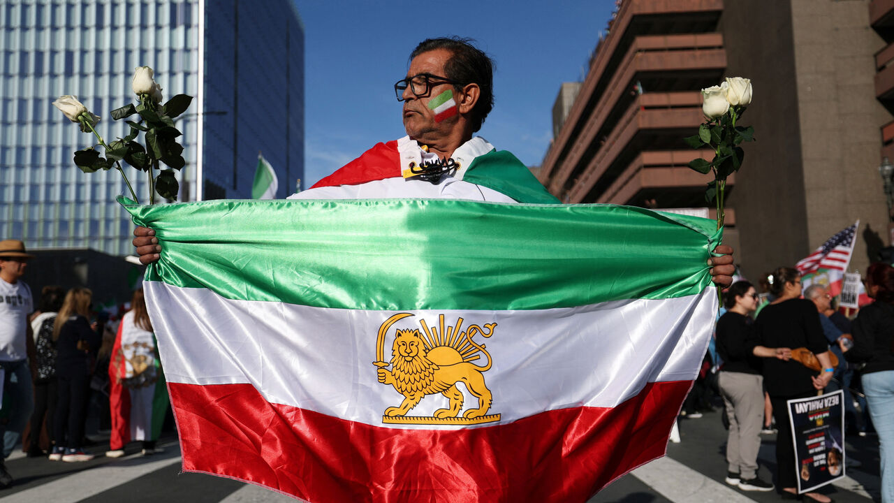 Demonstrators take part in a march in support of the people of Iran by members of the American-Iranian community in in Los Angeles.