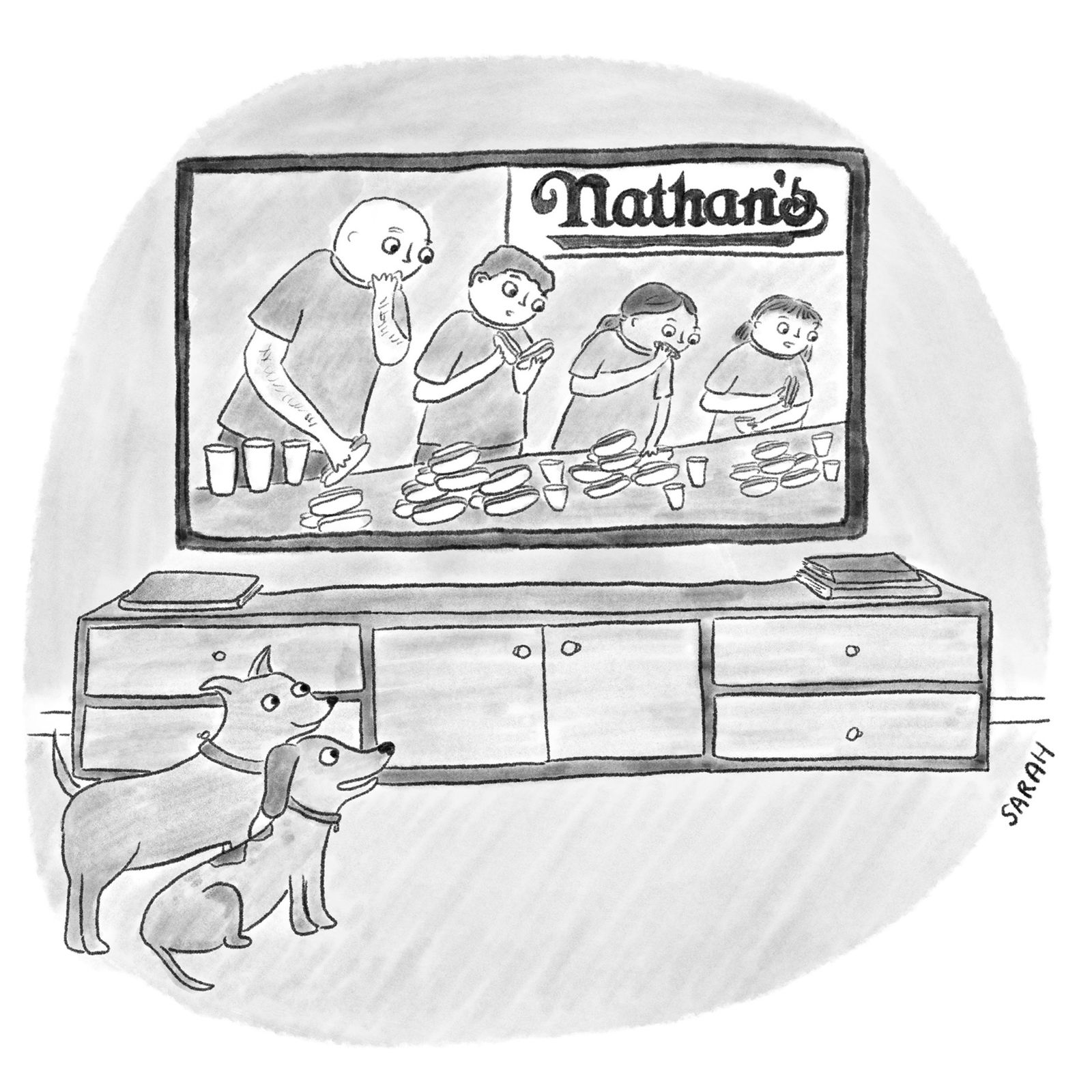 Two dogs watching a TV broadcast of the annual Nathan’s Hot Dog Eating Contest.