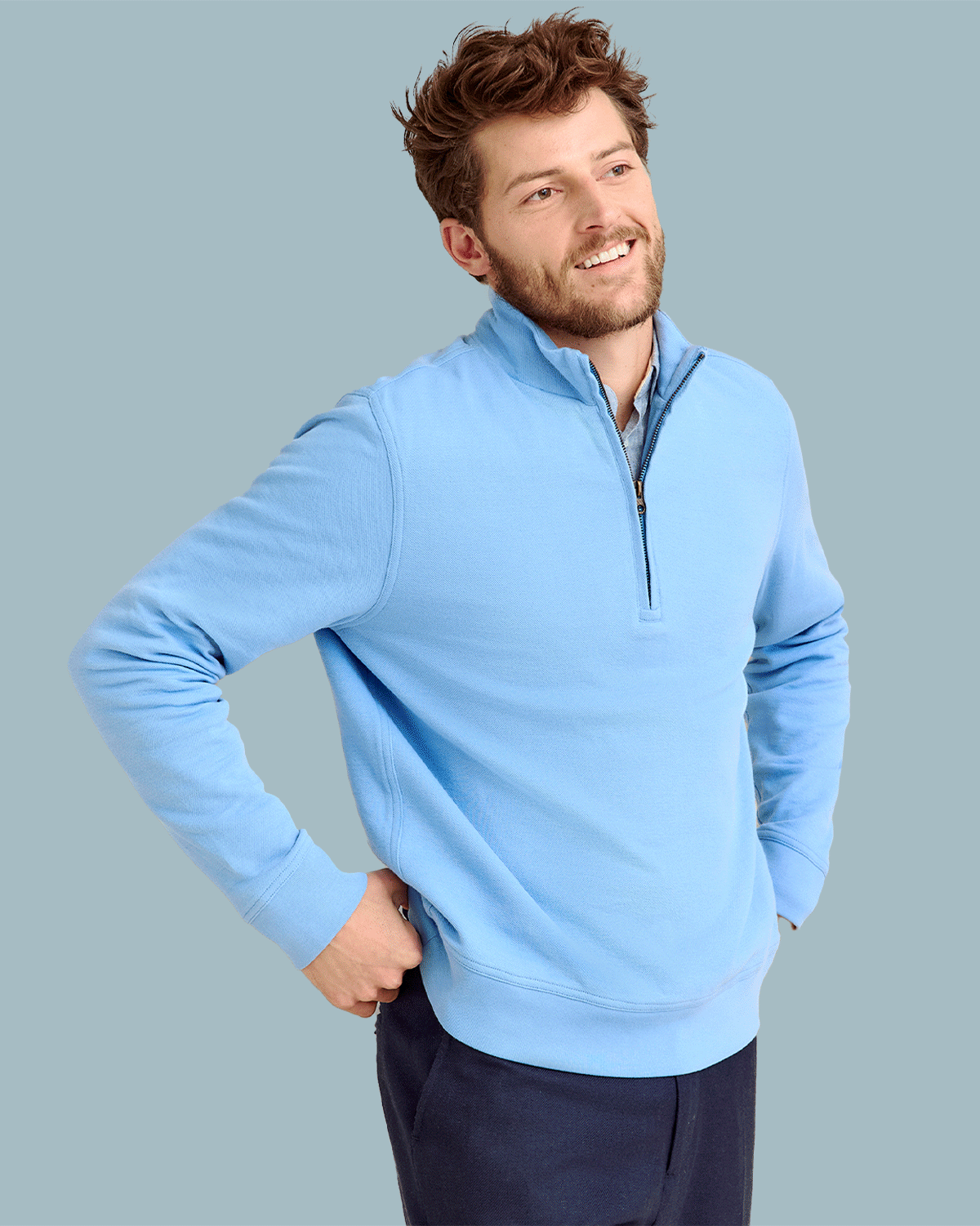 Models wear blue clothing pieces from Billy Reid.