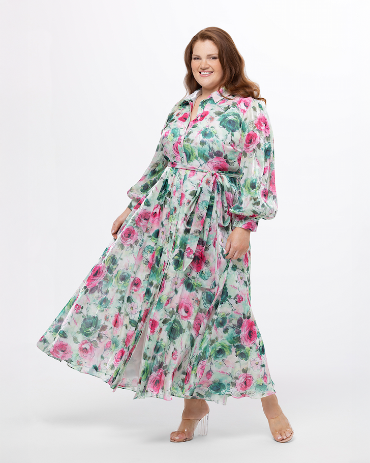 Woman wearing pink and green floral maxi dress with a collar.